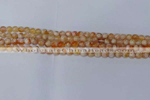 CAA1071 15.5 inches 6mm round sakura agate gemstone beads