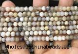 CAA3586 15.5 inches 4mm round matte ocean fossil agate beads