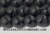 CAA3655 15.5 inches 6mm round matte & carved black agate beads