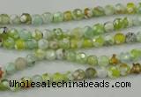 CAA707 15.5 inches 4mm faceted round fire crackle agate beads