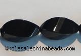 CAB797 15.5 inches 12*24mm faceted & twisted rice black agate beads