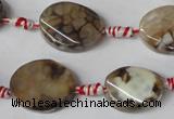 CAG1576 15.5 inches 15*20mm twisted oval fire crackle agate beads