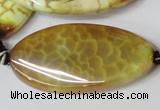 CAG1579 15.5 inches 20*40mm twisted oval fire crackle agate beads