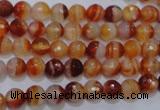 CAG2701 15.5 inches 6mm faceted round red line agate beads