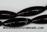 CAG2969 15.5 inches 10*30mm rice black line agate beads