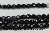 CAG5271 15.5 inches 4mm faceted round black line agate beads