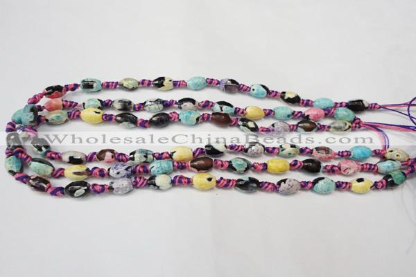 CAG5770 15 inches 6*9mm faceted rice fire crackle agate beads