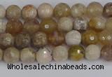 CAG9852 15.5 inches 4mm faceted round ocean fossil agate beads