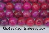 CAG9925 15.5 inches 6mm round fuchsia crazy lace agate beads