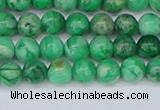 CAG9938 15.5 inches 4mm round green crazy lace agate beads