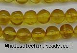 CAR551 15.5 inches 6mm - 7mm round natural amber beads wholesale