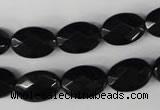 CBS310 15.5 inches 10*14mm faceted oval blackstone beads wholesale