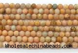 CCA551 15.5 inches 6mm round peach calcite gemstone beads