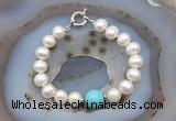 CFB1016 Hand-knotted 9mm - 10mm potato white freshwater pearl & blue howlite bracelet