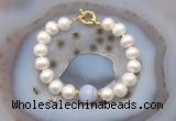 CFB1075 Hand-knotted 9mm - 10mm potato white freshwater pearl & blue lace agate bracelet