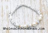 CFB702 faceted rondelle white howlite & potato white freshwater pearl stretchy bracelet