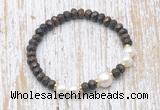 CFB756 faceted rondelle bronzite & potato white freshwater pearl stretchy bracelet