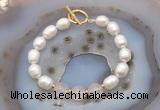 CFB934 Hand-knotted 9mm - 10mm rice white freshwater pearl & rose quartz bracelet