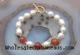 CFB961 Hand-knotted 9mm - 10mm rice white freshwater pearl & fire agate bracelet