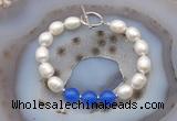 CFB990 Hand-knotted 9mm - 10mm rice white freshwater pearl & candy jade bracelet