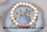 CGB6468 8mm round matte white fossil jasper & pink wooden jasper beaded bracelets