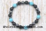 CGB8379 8mm blue howlite, black onyx & hematite energy bracelet