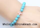 CGB9352 8mm, 10mm blue howlite & cross hematite power beads bracelets