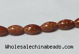 CGS69 15.5 inches 6*10mm rice goldstone beads wholesale