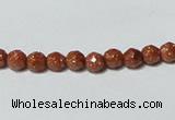 CGS88 15.5 inches 4mm faceted round goldstone beads wholesale