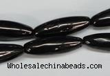 CJB54 15.5 inches 10*30mm rice natural jet gemstone beads