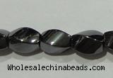 CMH151 15.5 inches 5*8mm twisted rice magnetic hematite beads