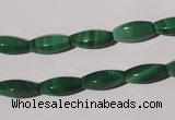 CMN224 15.5 inches 5*12mm faceted rice natural malachite beads