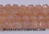 CMS1131 15.5 inches 6mm faceted nuggets peach moonstone beads