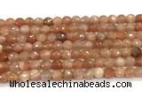 CMS2258 15 inches 6mm faceted round orange moonstone beads