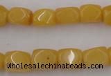 CNG807 15.5 inches 9*12mm faceted nuggets yellow jade beads