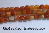 CNG8188 15.5 inches 10*14mm nuggets striped agate beads wholesale