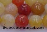 CRO1165 15.5 inches 14mm round golden silk jade beads wholesale