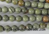 CSL102 15.5 inches 8mm round silver leaf jasper beads wholesale