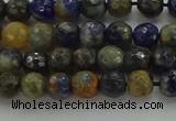 CSO751 15.5 inches 6mm faceted round orange sodalite beads