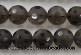 CSQ254 15.5 inches 14mm carved round matte smoky quartz beads