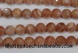 CSS502 15.5 inches 7mm faceted round natural golden sunstone beads