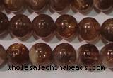 CSS553 15.5 inches 7mm round natural golden sunstone beads