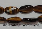 CTE1098 15.5 inches 10*20mm twisted & faceted oval yellow tiger eye beads