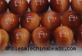 CTE1664 15.5 inches 12mm round sun orange tiger eye beads