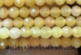 CTG1035 15.5 inches 2mm faceted round tiny yellow jade beads