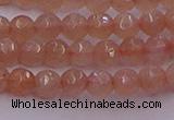 CTG507 15.5 inches 4mm faceted round tiny peach moonstone beads