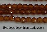 CTG554 15.5 inches 4mm faceted round tiny orange garnet beads