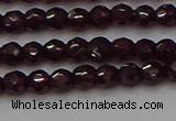 CTG555 15.5 inches 4mm faceted round tiny purple garnet beads