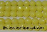 CTU2524 15.5 inches 6mm faceted round synthetic turquoise beads