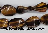 CTW63 15.5 inches 13*18mm twisted oval yellow tiger eye beads